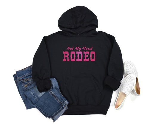 Women's Hooded Sweatshirt Not My First Rodeo Hot Pink embroidery on Black Hoodie