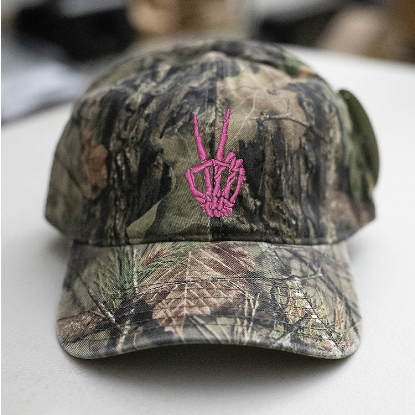 Skeleton Hand Peace Sign Mossy Oak Camo Hat Embroidered