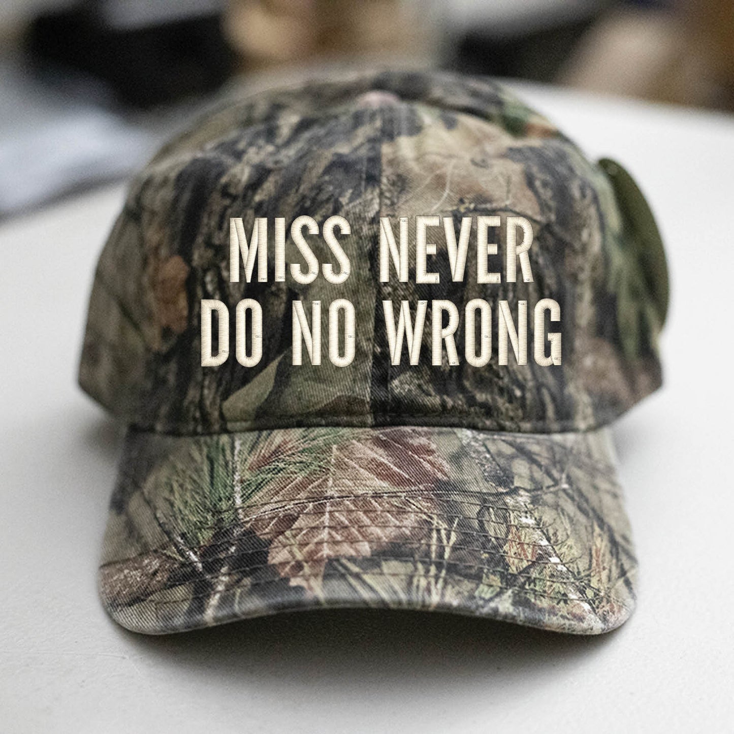 MISS NEVER DO NO WRONG Camo Hat